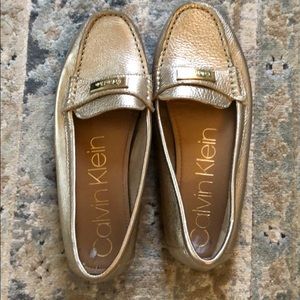 Lightly worn Calvin Klein gold loafers- no damage!
